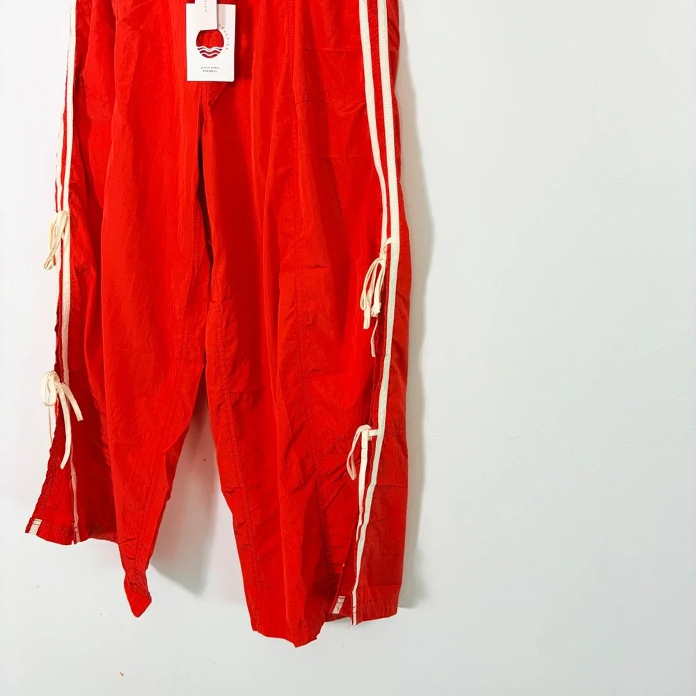 Daily Practice Anthropologie Red Parachute Bow Track Pants Women's Medium - Picture 4 of 9